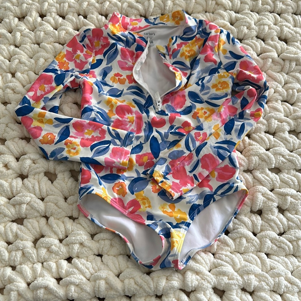 Carters one-piece rashguard swimsuit.